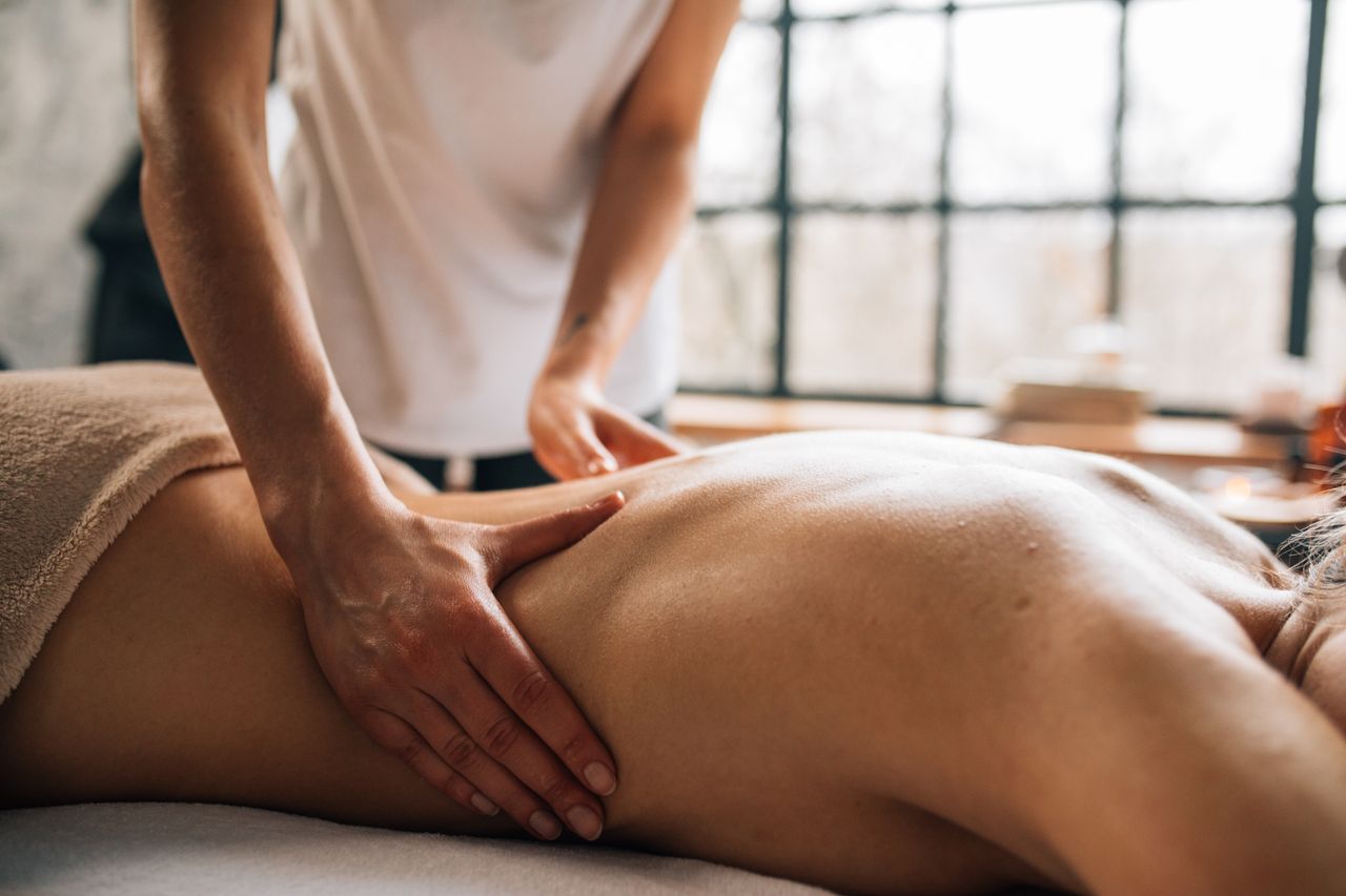 hero-img-01 Experience relaxation with a full body massage in a serene indoor spa environment.